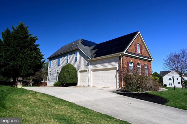 Attached, Exterior, Facade, Brick Facade, Solar Panels, Brick Traditional
