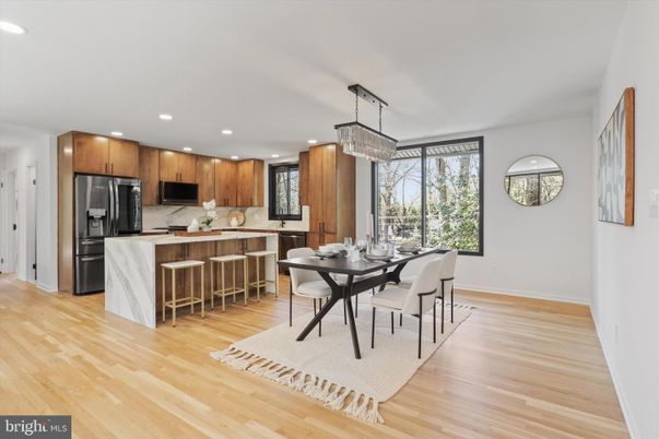 Chandelier, Dining room, Interior, Kitchen, Pendant Lights, Recessed Lighting, Stainless Steel Appliances, Wood Texture Flooring