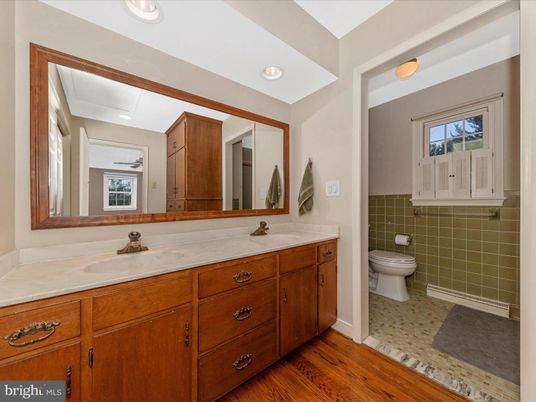 Bathroom, Dual Sink Vanities, Interior, Recessed Lighting, Wood Texture Flooring