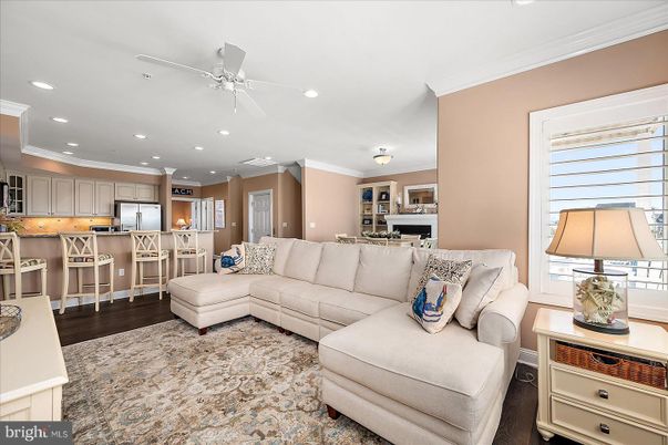 Dining room, Interior, Kitchen, Living room, Recessed Lighting, Stainless Steel Appliances, Wood Texture Flooring