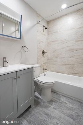 Bathroom, Interior, Marble Walls, Recessed Lighting, Wood Texture Flooring