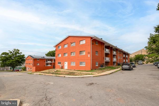 Exterior, Facade, Brick Facade, Condo Building