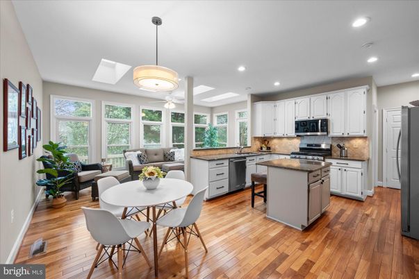 Dining room, Interior, Kitchen, Living room, Pendant Lights, Recessed Lighting, Stainless Steel Appliances, Wood Texture Flooring