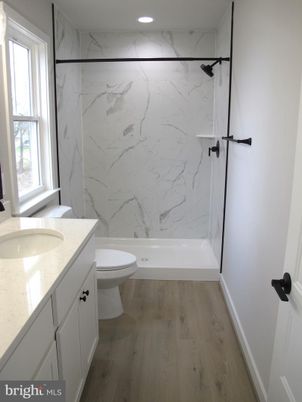 Bathroom, Interior, Marble Walls, Recessed Lighting, Wood Texture Flooring