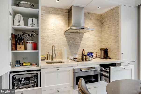 Interior, Kitchen, Recessed Lighting, Stainless Steel Appliances, Stone Walls, Washer