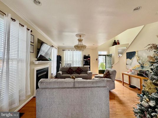 Chandelier, Fireplace, Interior, Living room, Recessed Lighting, Wood Texture Flooring