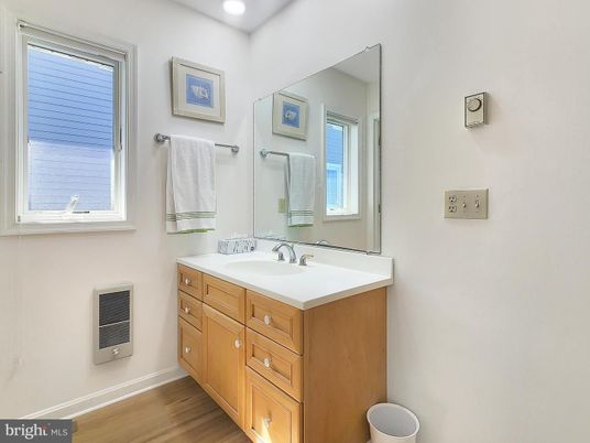 Bathroom, Dual Sink Vanities, Interior, Recessed Lighting, Wood Texture Flooring