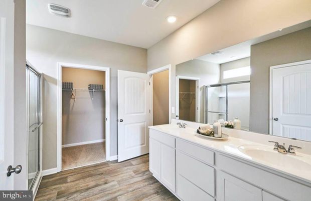 Bathroom, Dual Sink Vanities, Interior, Recessed Lighting, Wood Texture Flooring