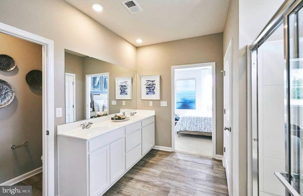 Bathroom, Bedroom, Dual Sink Vanities, Interior, Recessed Lighting, Wood Texture Flooring