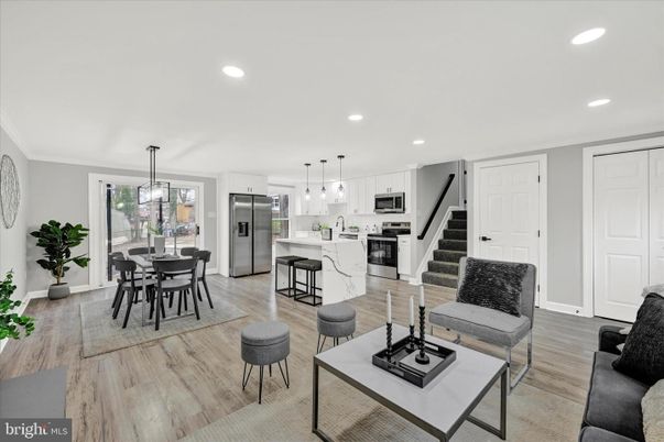 Dining room, Interior, Kitchen, Pendant Lights, Recessed Lighting, Stainless Steel Appliances, Wood Texture Flooring