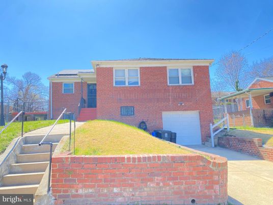Attached, Exterior, Facade, Brick Facade, Solar Panels, Split Level