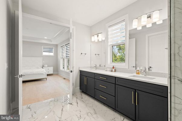 Bathroom, Bedroom, Dual Sink Vanities, Interior, Marble, Marble Walls, Recessed Lighting, Wood Texture Flooring