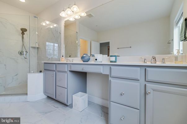 Bathroom, Dual Sink Vanities, Glass Shower, Interior, Marble, Marble Walls, Recessed Lighting
