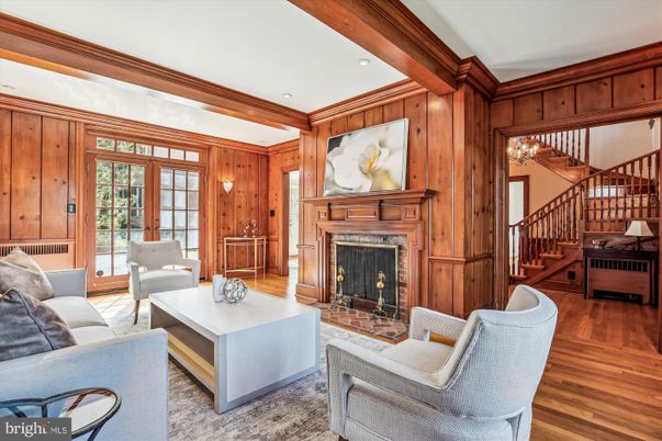 Chandelier, Fireplace, Interior, Living room, Recessed Lighting, Wood Texture Flooring, Wooden Walls