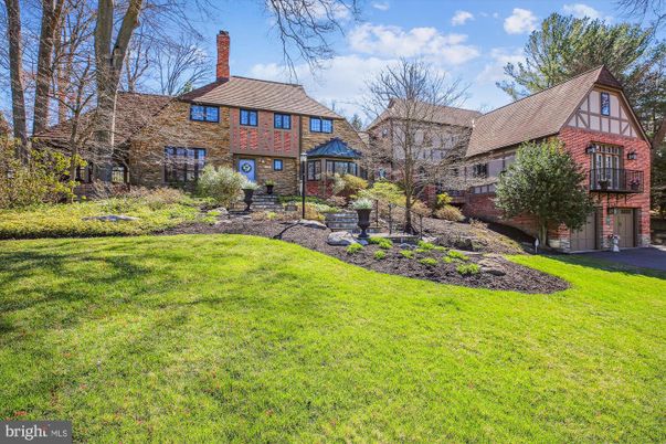 Attached, Backyard, Exterior, Facade, Brick Facade, Tudor Revival