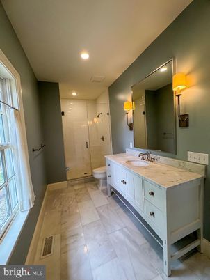 Bathroom, Dual Sink Vanities, Glass Shower, Interior, Marble, Recessed Lighting