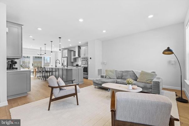 Dining room, Interior, Kitchen, Living room, Pendant Lights, Recessed Lighting, Stainless Steel Appliances, Wood Texture Flooring
