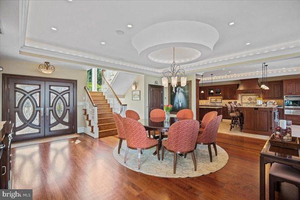 Chandelier, Dining room, Interior, Kitchen, Pendant Lights, Recessed Lighting, Stainless Steel Appliances, Wood Texture Flooring
