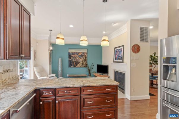 Fireplace, Interior, Kitchen, Pendant Lights, Recessed Lighting, Stainless Steel Appliances, Wood Texture Flooring