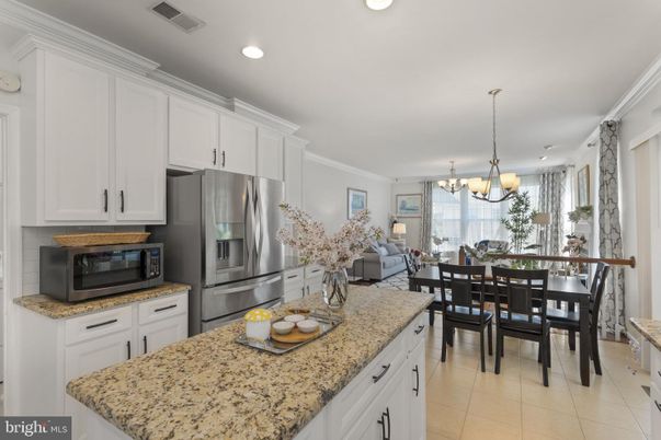 Chandelier, Dining room, Interior, Kitchen, Living room, Recessed Lighting, Stainless Steel Appliances
