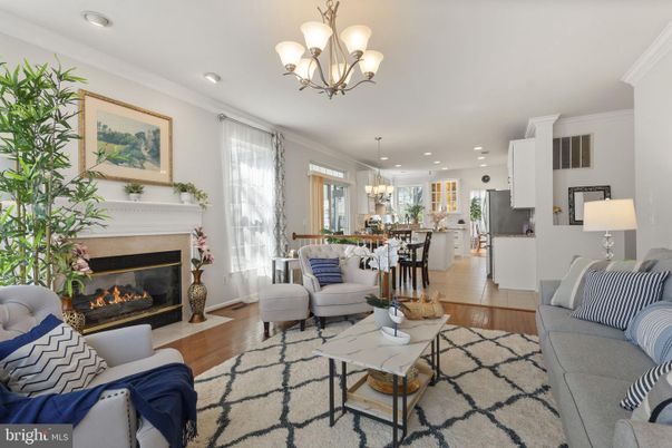 Chandelier, Dining room, Fireplace, Interior, Kitchen, Living room, Pendant Lights, Recessed Lighting, Wood Texture Flooring