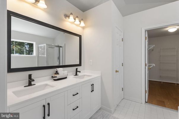 Bathroom, Dual Sink Vanities, Interior, Walk-in Closets, Wood Texture Flooring