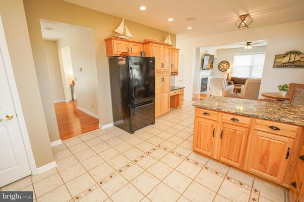 Fireplace, Interior, Kitchen, Recessed Lighting, Wood Texture Flooring