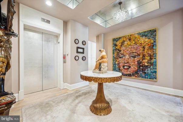 Chandelier, Elevator, Interior, Recessed Lighting, Wood Texture Flooring