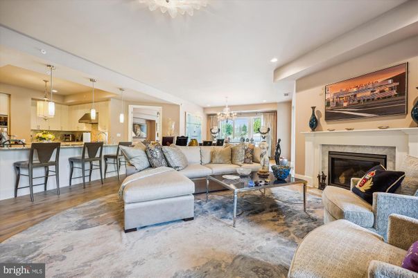 Chandelier, Dining room, Fireplace, Interior, Kitchen, Living room, Pendant Lights, Recessed Lighting, Wood Texture Flooring
