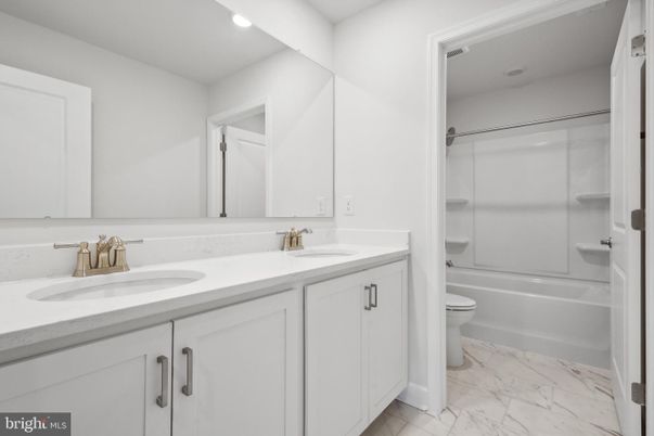 Bathroom, Dual Sink Vanities, Glass Shower, Interior, Marble, Recessed Lighting