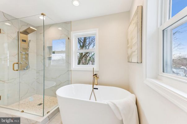 Bathroom, Free Standing Baths, Glass Shower, Interior, Marble Walls, Recessed Lighting
