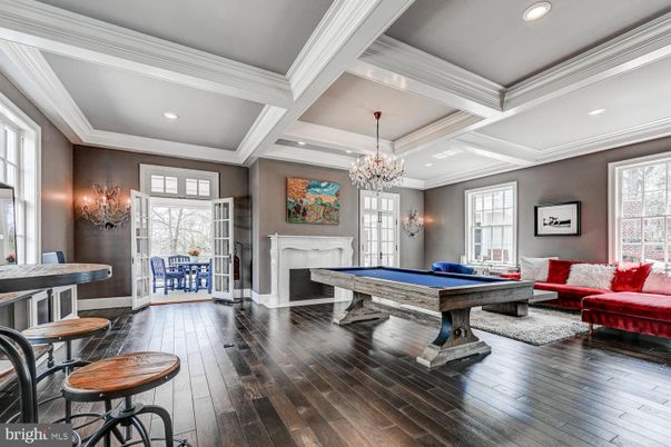 Billiard Table, Chandelier, Fireplace, Game Room, Interior, Recessed Lighting, Wood Texture Flooring
