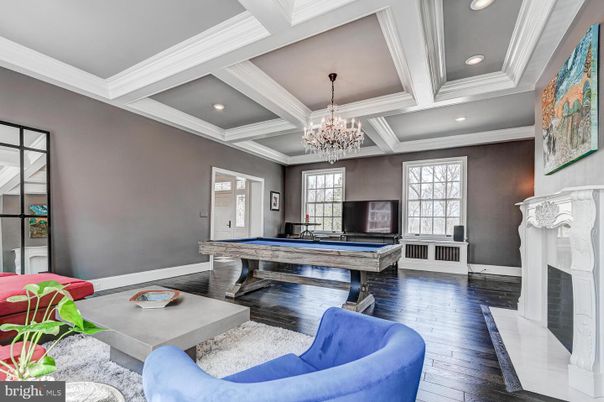 Billiard Table, Chandelier, Fireplace, Game Room, Interior, Recessed Lighting, Wood Texture Flooring