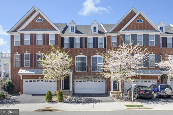 Attached, Exterior, Facade, Brick Facade, Rowhouse