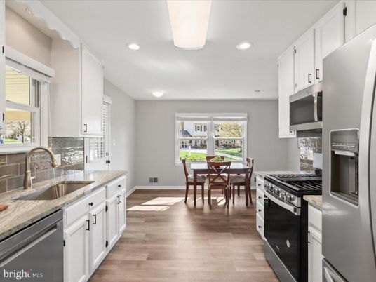 Dining room, Interior, Kitchen, Recessed Lighting, Stainless Steel Appliances, Wood Texture Flooring