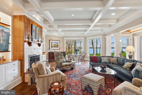 Dining room, Fireplace, Interior, Living room, Recessed Lighting, Wood Texture Flooring