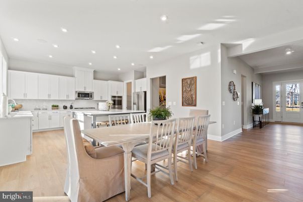 Dining room, Interior, Kitchen, Recessed Lighting, Stainless Steel Appliances, Wood Texture Flooring