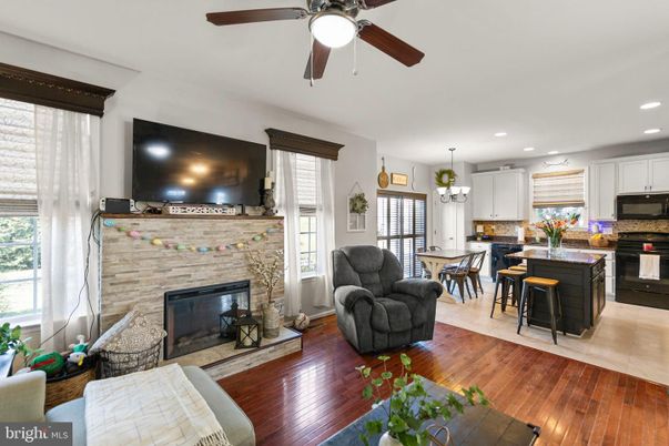 Chandelier, Dining room, Fireplace, Interior, Kitchen, Recessed Lighting, Wood Texture Flooring