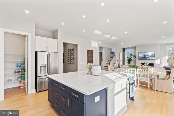 Dining room, Interior, Kitchen, Recessed Lighting, Stainless Steel Appliances, Wood Texture Flooring