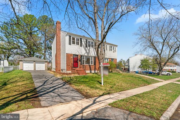 Backyard, Detached Garage, Exterior, Facade, Brick Facade, Raised Ranch