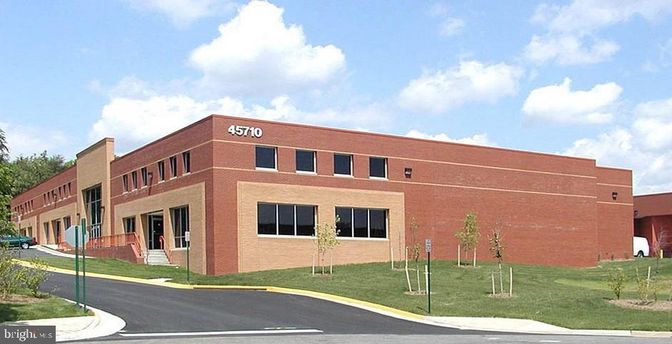Exterior, Facade, Brick Facade, Condo Building