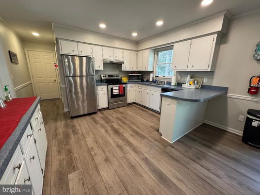 Interior, Kitchen, Recessed Lighting, Stainless Steel Appliances, Wood Texture Flooring