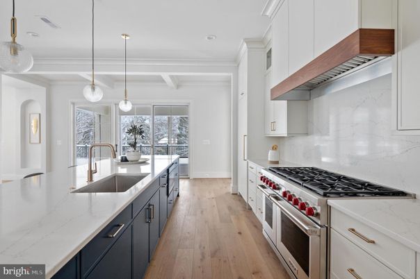 Interior, Kitchen, Marble Walls, Pendant Lights, Recessed Lighting, Stainless Steel Appliances, Wood Texture Flooring