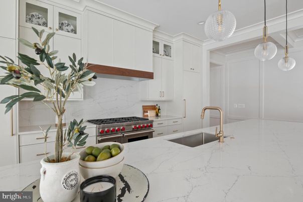 Interior, Kitchen, Marble Walls, Pendant Lights, Recessed Lighting, Stainless Steel Appliances
