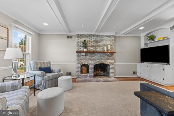 Fireplace, Interior, Living room, Recessed Lighting, Stone Walls, Wood Texture Flooring