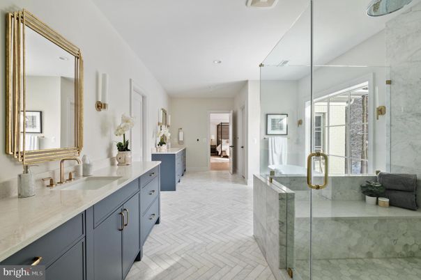 Bathroom, Dual Sink Vanities, Glass Shower, Interior, Marble Walls, Recessed Lighting