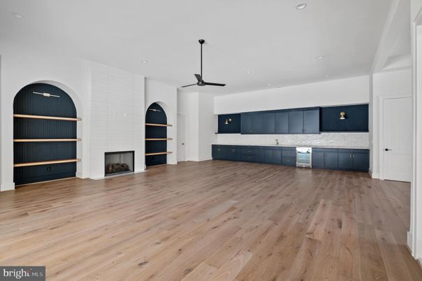 Empty room, Fireplace, Interior, Kitchen, Recessed Lighting, Wood Texture Flooring