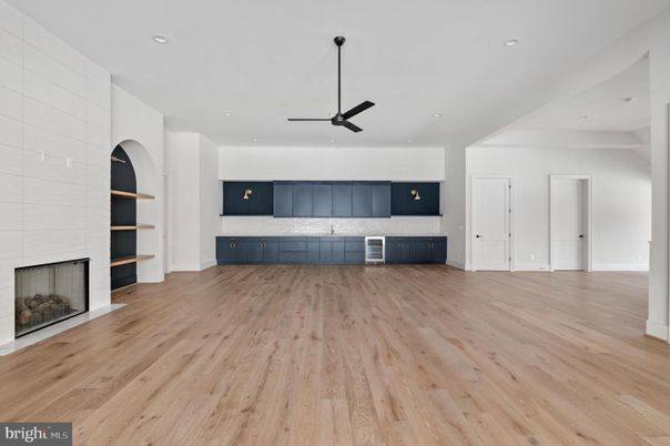 Empty room, Fireplace, Interior, Kitchen, Recessed Lighting, Wood Texture Flooring