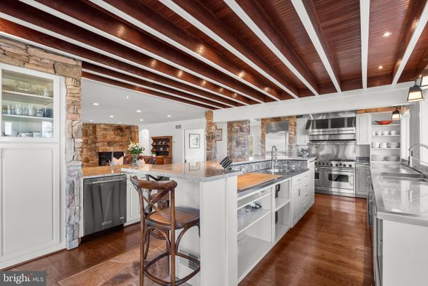 Fireplace, Interior, Kitchen, Recessed Lighting, Stainless Steel Appliances, Stone Walls, Wooden Beams, Wooden Ceilings, Wood Texture Flooring