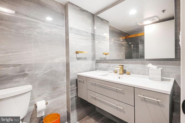 Bathroom, Dual Sink Vanities, Glass Shower, Interior, Recessed Lighting, Wood Texture Flooring